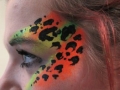 student face art uv leopard