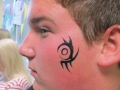 student face painting tribal design