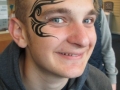 student temporary tribal tattoos face painting