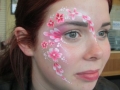 teen face painting flowers desgin, freshers week